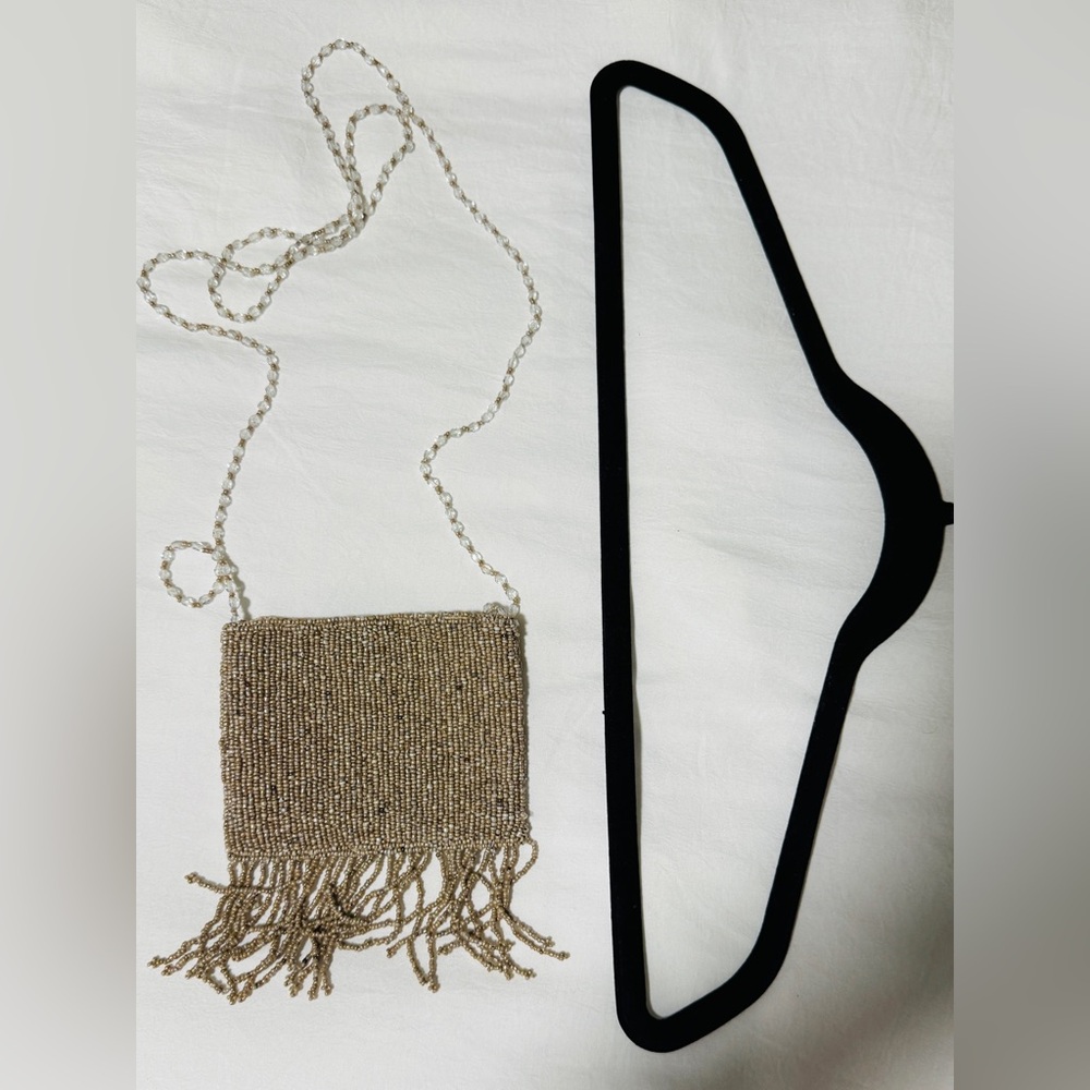 Elegant Beaded Tan Clutch